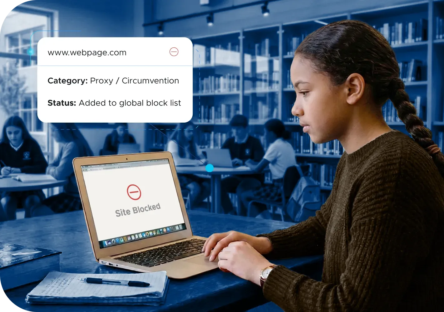 Student seeing a blocked notification on laptop
